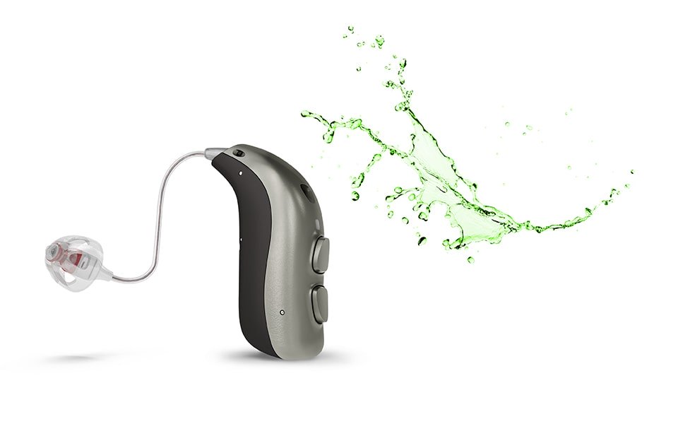 Bernafon hearing aid next to splash of potentially harmful chemicals