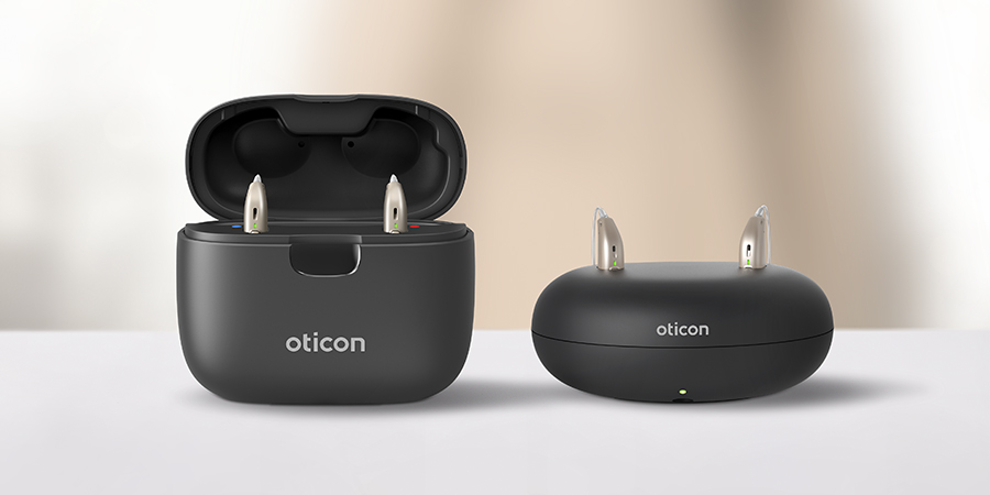 oticon_real_minirite_r_chargers_and_reception_bell_background_as_110446468-900x450